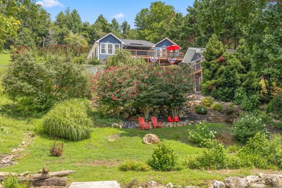 Serene River view Retreat w/Hot Tub+Pool+Boat Dock - Image 2